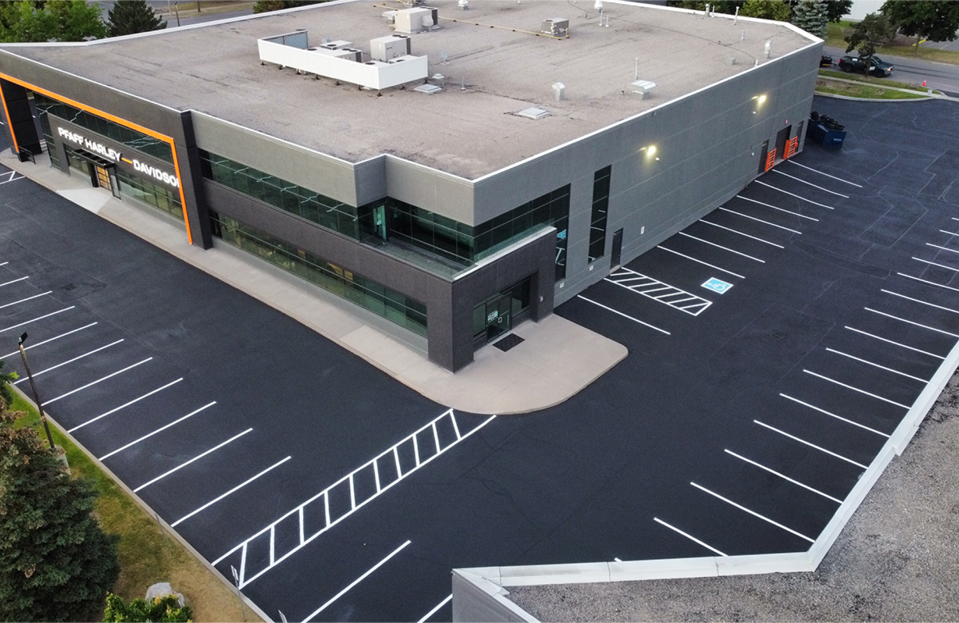 Seal Canada Aerial view of the Pfaff Harley-Davidson dealership and its surrounding concrete parking lots. Asphalt & Coatings